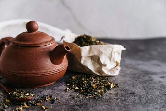 Pu-erh tea in pot and leaves