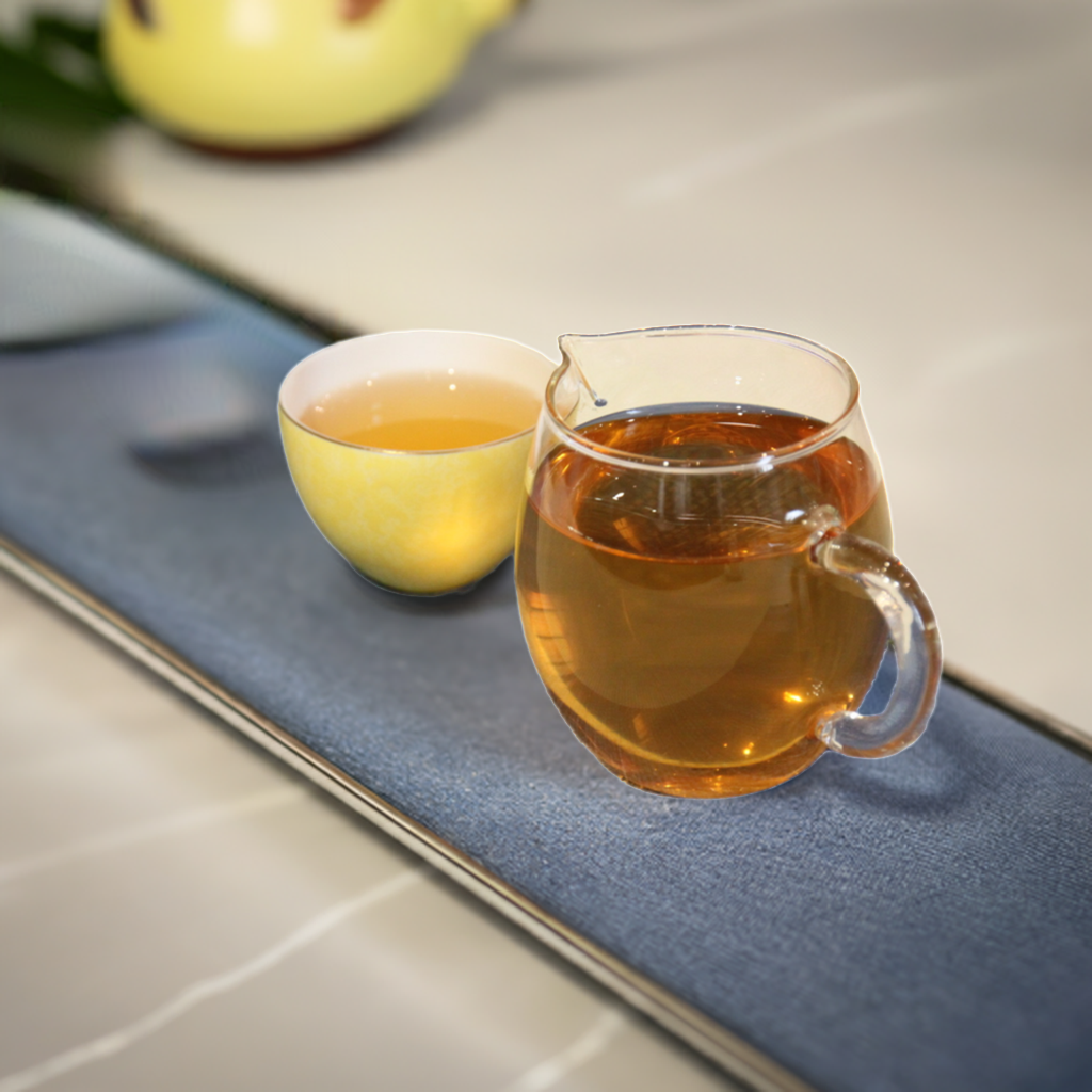 2011 Tianchao Tribute Ancient Tree Raw Pu-erh Tea in a tea cup