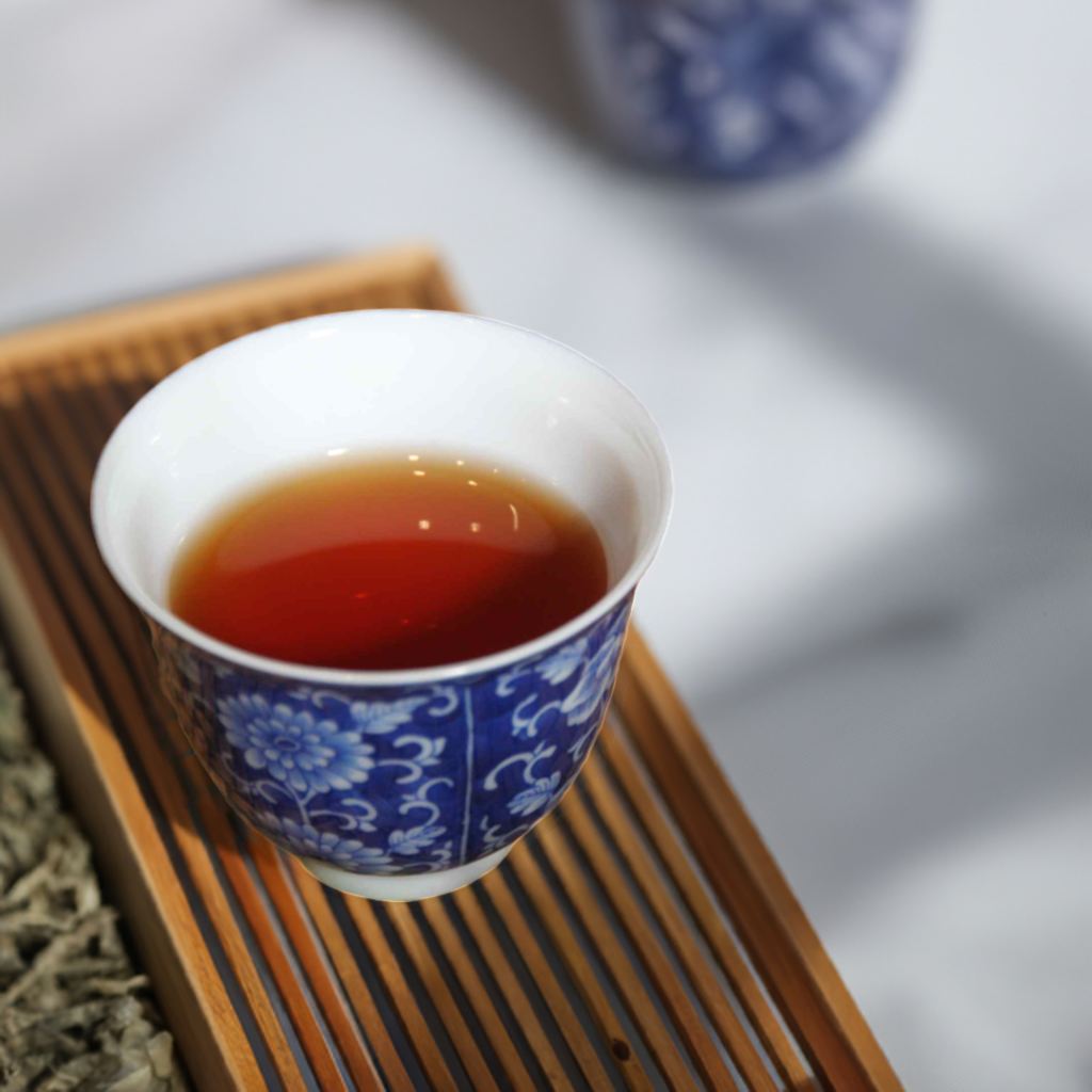 2009 Tianchao Tribute Ancient Tree Ripe Pu-erh Tea in a tea cup