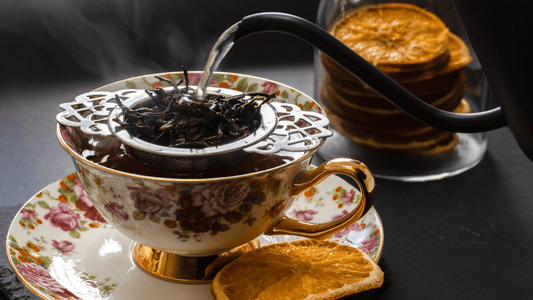 compressed Pu-erh tea being Pured in a Chinese cup