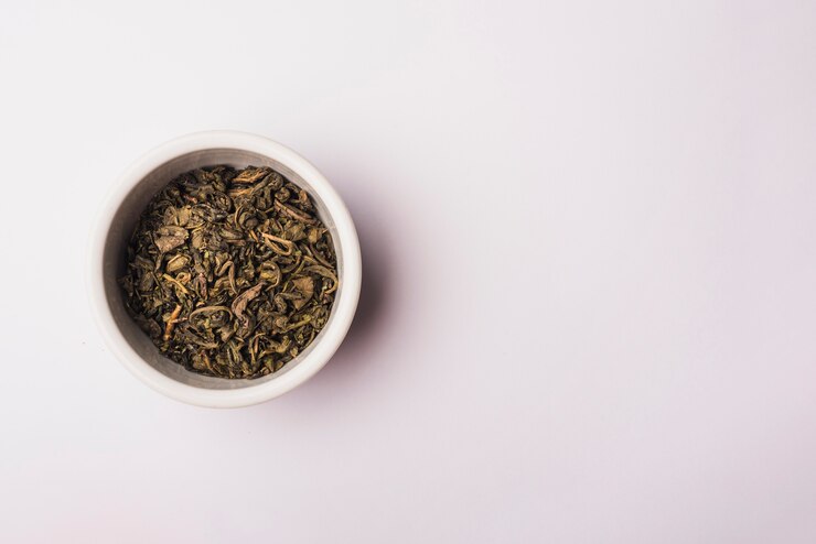 Pu-erh tea leaves in cup