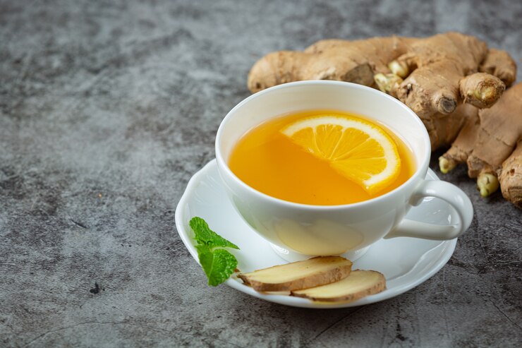 Green tea in cup with ginger