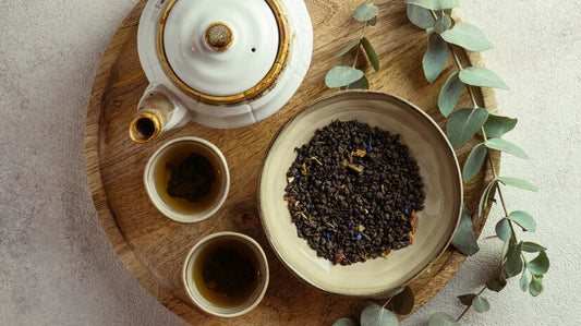 Tea Pot cups and Pu-erh tea leaves