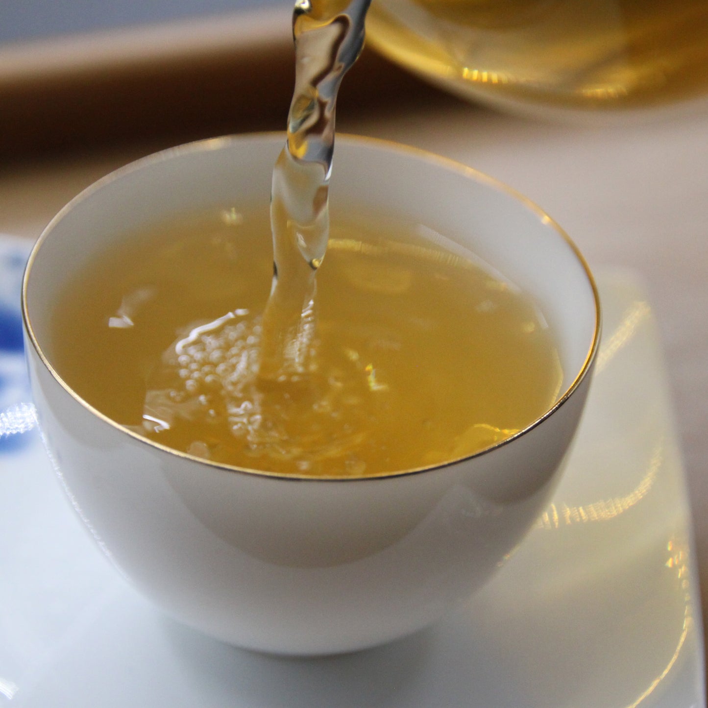 2013 Ancient Tree Pu-erh tea filled in a chinese cup