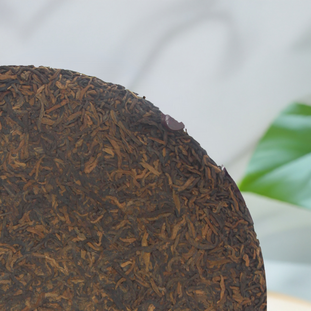 2009 Qi Zi Cake Ancient Tree Ripe Pu-erh Tea