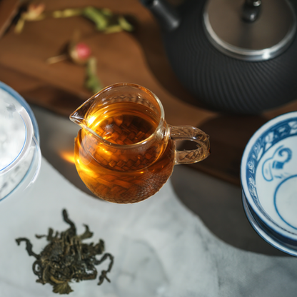 2012 Yiwu Mountain Pu-erh Raw Tea in a organic tea pot