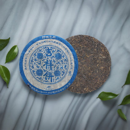 Textured image of 2010 Auspicious Cake Ancient Tree Raw Pu-erh Tea Cake