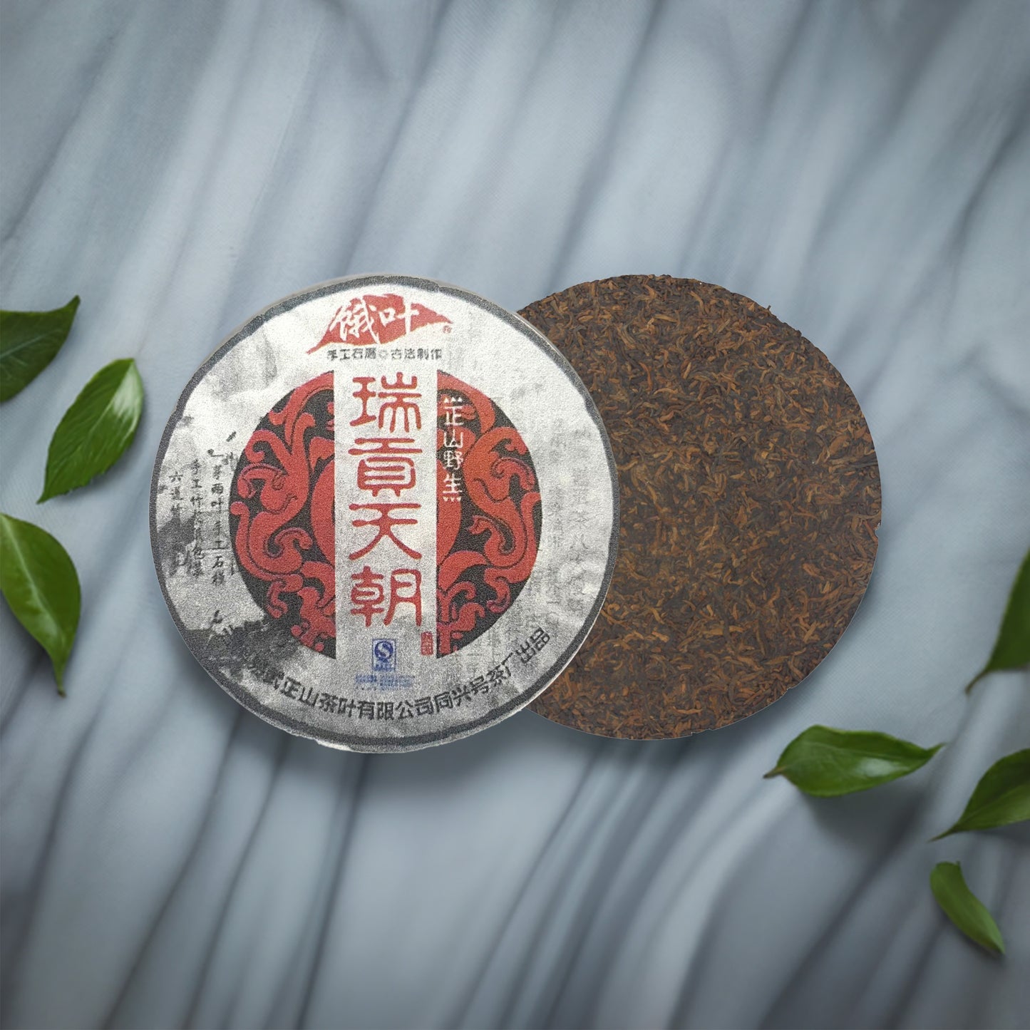 Textured image of 2009 Tianchao Tribute Ancient Tree Ripe Pu-erh Tea Cake